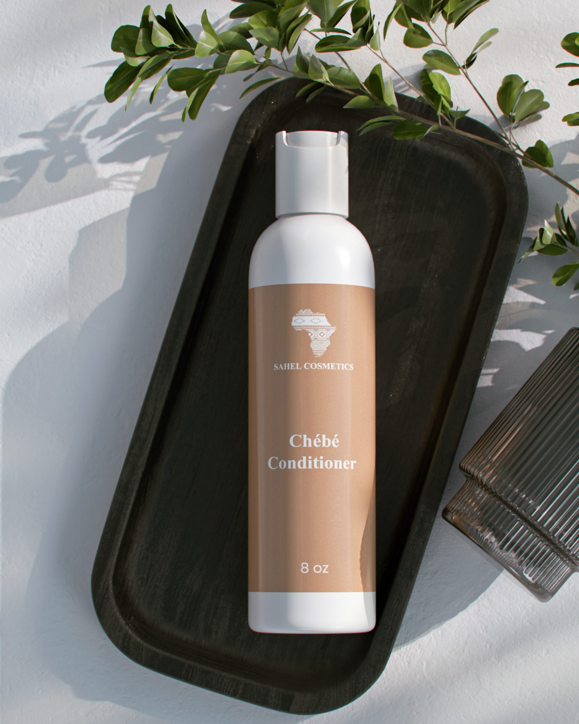 Chebe hair conditioner bottle for reducing dryness and breakage. Sahel Cosmetics 