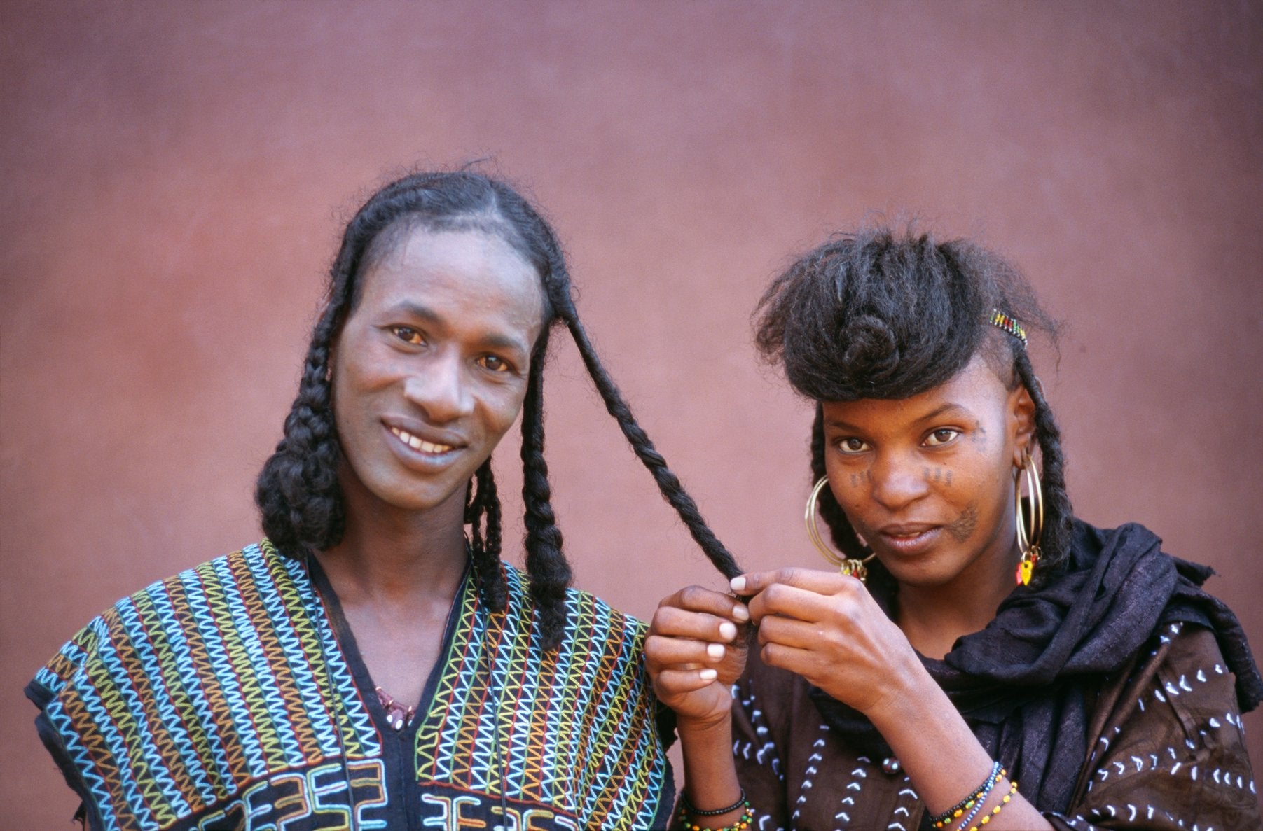 Smooth frizz-controlled hair after using African Nomads hair butter
