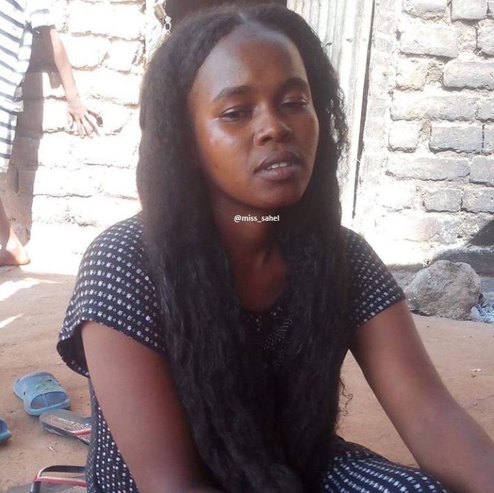 Woman showing long healthy hair after chebe powder treatment
